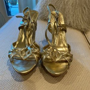 Designer gold leather wedge heels